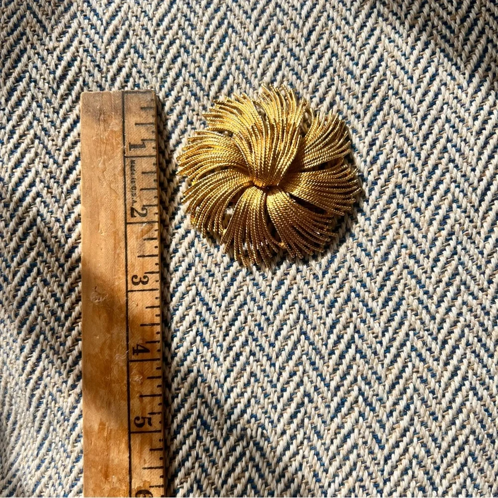 Vintage Monet pin from 1960’s with some patina on the metal - lovely for…